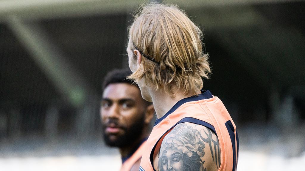 2019_08_02_GALLERY_HERO.jpg Esava Ratugolea and Tom Stewart share a moment. - Geelong Cats,Fremantle Dockers